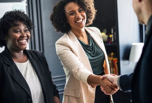 business-partners-shaking-hands-agreement_53876-95772